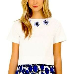 Kate Spade short sleeve cropped blouse with blue flower design